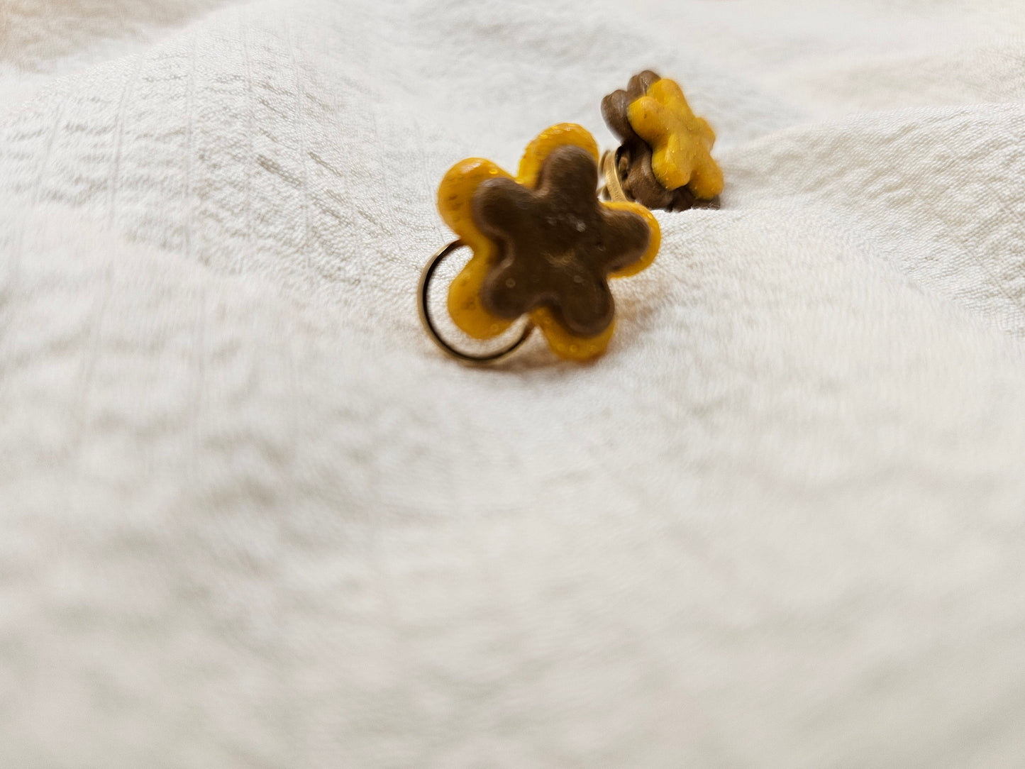 Small yellow and brown ear jewels