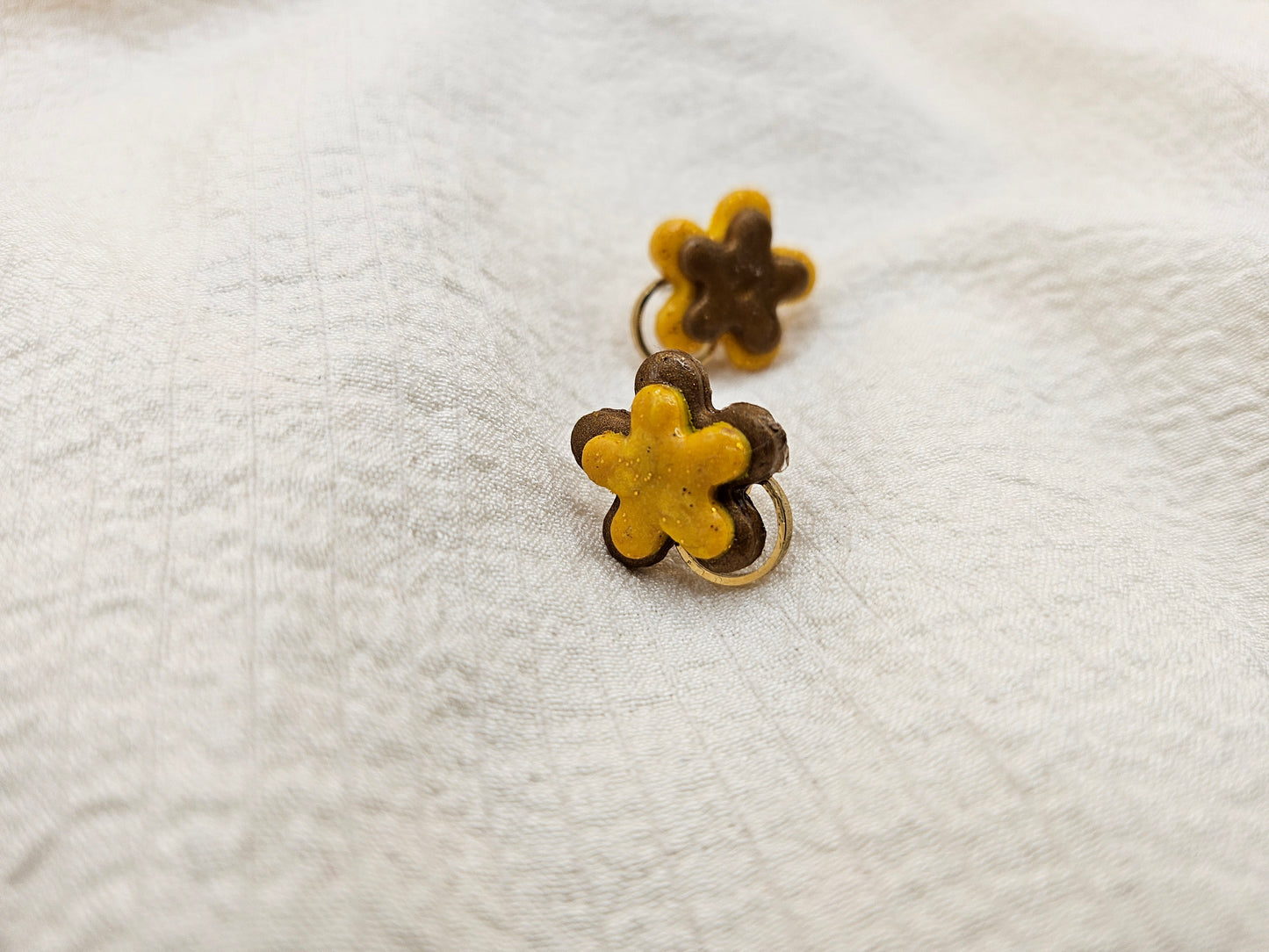 Small yellow and brown ear jewels