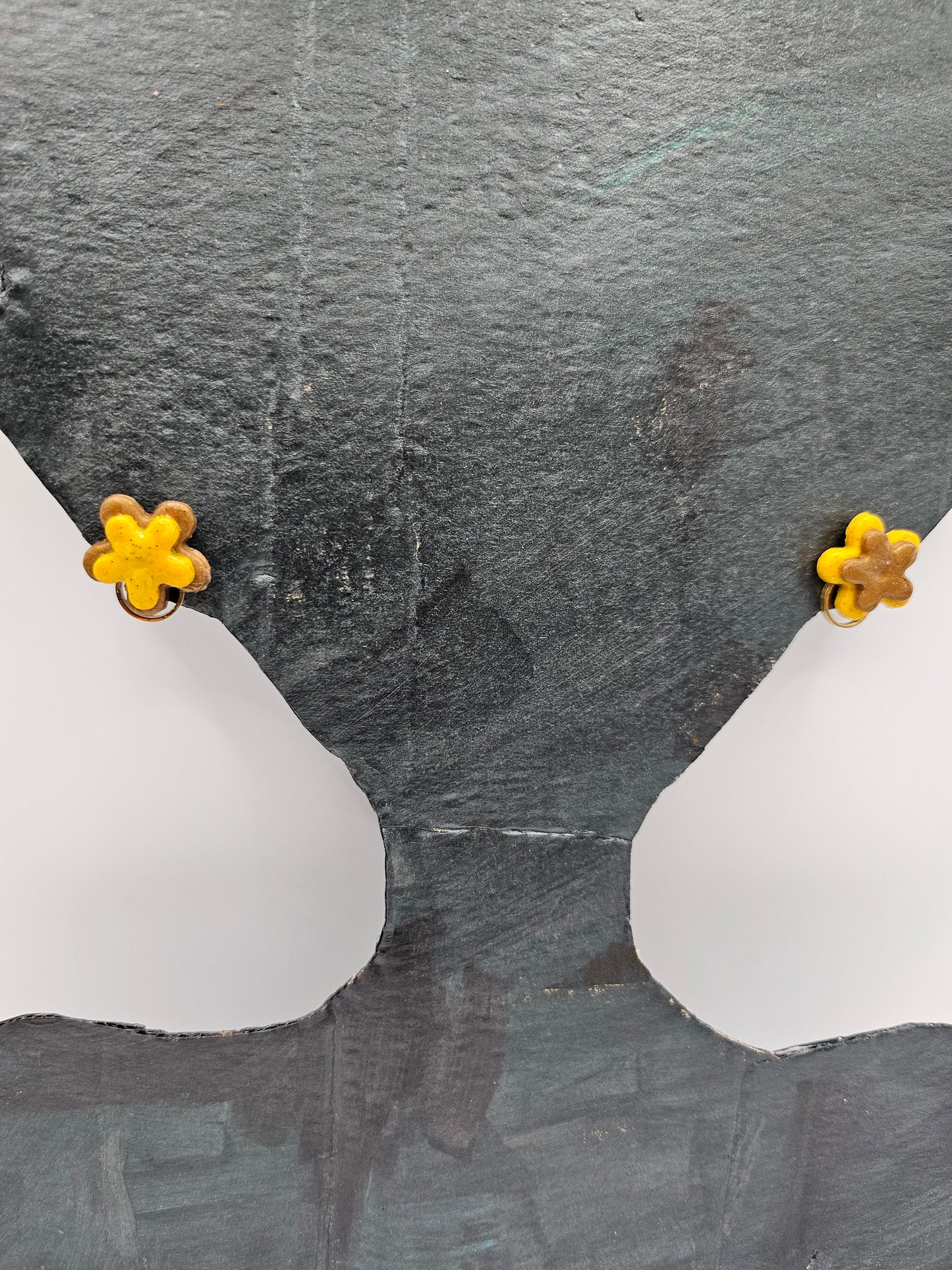 Small yellow and brown ear jewels