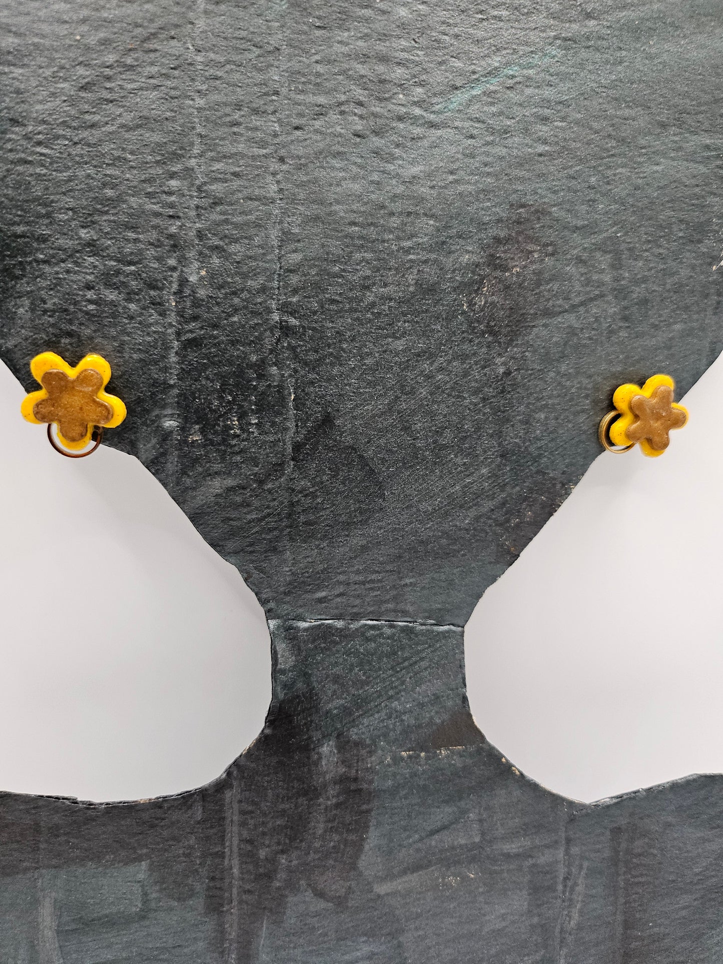 Small yellow and brown ear jewels